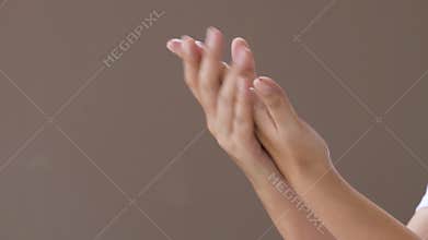 Washing hand by alcohol gel from bottle pump for anti coronavirus.