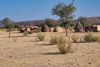 Opuwo, Namibia - Jul 07, 2019: Typical Himba tribe village near Opuwo, capital of the Kunene Region in Namibia