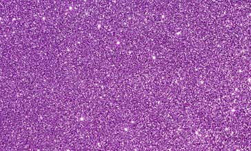 Shiny pink or purple glitter background with light reflections