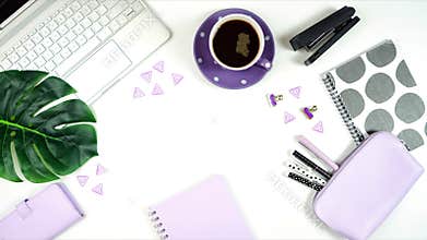 Desktop workspace with hi-tech laptop and modern colorful accessories.
