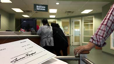 Motion of people line up for deposit the check inside TD Bank