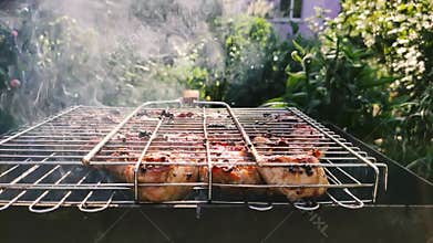 Meat on the grill. Slow motion Grilling a Steak on the BBQ. Grilled Meat Preparing.