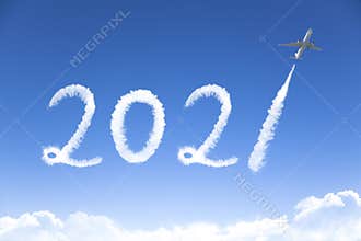 Happy New year 2021 concept. cloud drawing by airplane in sky