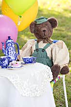 Cute bear at tea party