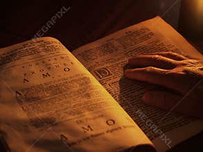 Old bible by candlelight