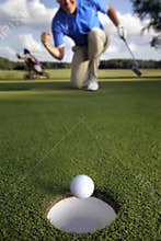 Ball rolling into the hole