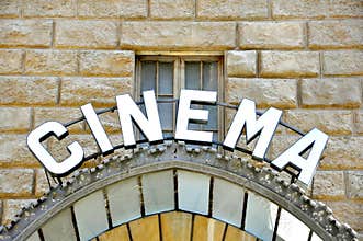 Vintage cinema sign in Italy