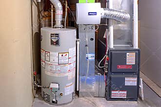 A home Goodman high efficiency furnace with Bradford White Residential gas water heater &