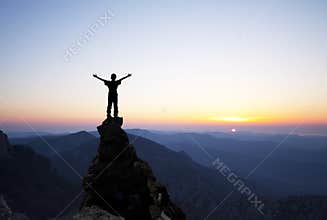 Man on the top of the rock