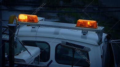 Lights Flashing On Breakdown Vehicle In The Rain