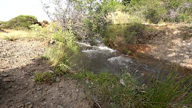 Crystal clear water flowing down the mountain
