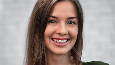 Closeup portrait of adorable woman smiling with open mouth showing teeth. 4k Dragon RED camera