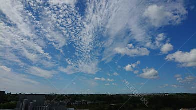 Spray of clouds against a backdrop of blue skies