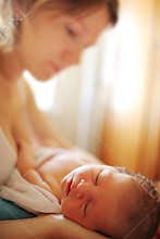 Newborn baby with mother