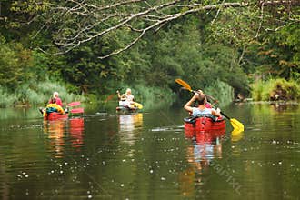 People boating on river