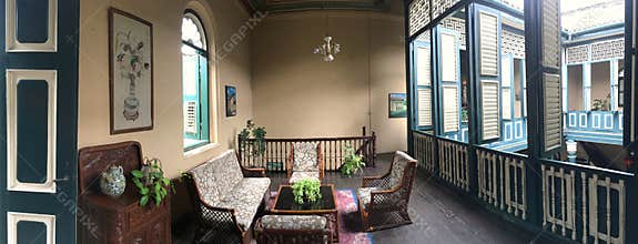 Typical Peranakan architecture with many internal windows and wooden building materials