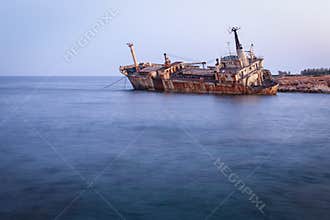 Abandoned rusty ship Edro III near Pegeia, Paphos, Cyprus at sunrise