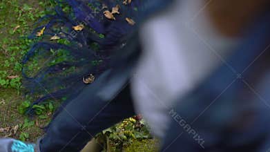 Urban citizen stepping over mother nature forest, environmental responsibility
