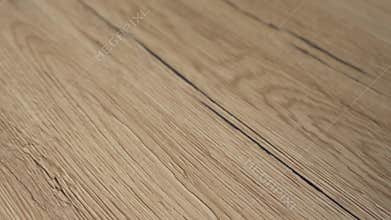 Closeup of the wood floor newly installed. Floor is made of the natural oak hard wood and sanded and finished with natural clear f
