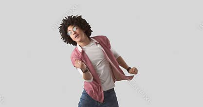 Happy man dancing over white background