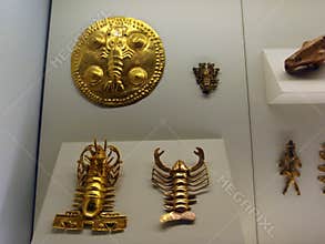 Gold pendants in the shape of lobsters