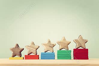 business concept image of setting a five star goal. increase rating or ranking, evaluation and classification idea