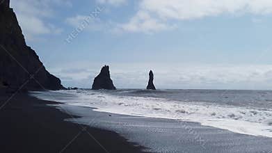 The black sand beach of Reynisfjara in the southern coast of Vik, Iceland.