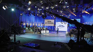 The camera on the crane in a TV studio during the recording TV