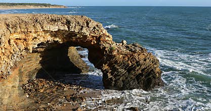Rocky arch on the coast