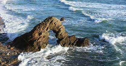 Rocky arch on the coast