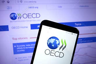 KONSKIE, POLAND - December 07, 2019: Organisation for Economic Cooperation and Development OECD logo on mobile phone