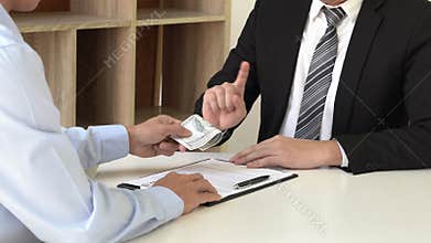 4k video of businessman manager refusing receive money in the envelope disgusted male employee giving to take bribe, corruption