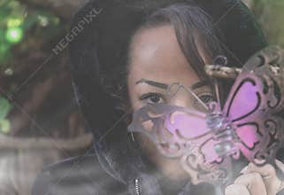 Decorative portrait of a woman with butterfly