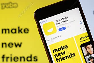 Los Angeles, California, USA - 24 March 2020: Yubo app logo on phone screen close up with website on background with icon,