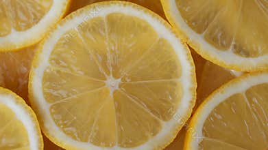 Lemon slices rotate closeup, food summer