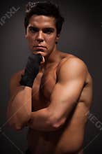 Handsome muscular man thinking