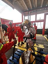 Marine  crews conduct fire drill on board ship
