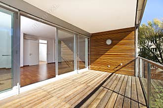 Sunlit balcony of contemporary architecture