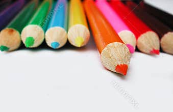 Isolated orange pencil crayon