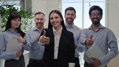 Portrait happy office group diverse multinational business people with corporate team leader show thumbs up gesture at