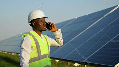 Portrait of black worker, solar panel and phone call for photovoltaic plate, sustainability advice or maintenance. Eco