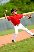Youth ball player throwing ball
