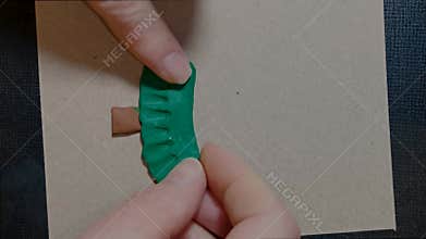 Modeling clay Christmas tree tutorial. Step by step winter holiday New Year handmade craft educational making vertical