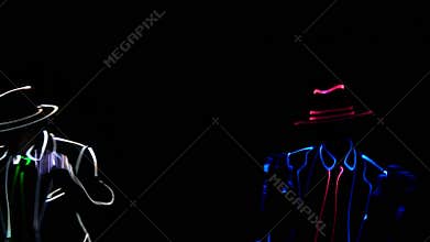 Light LED dance show. dancers in costumes with LED strip dancing in a nightclub. Party concept