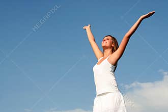 Woman with arms wide open