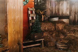 sheaves of hay in a wooden barn. harvesting food dry straw for feeding livestock. rustic country retro scene
