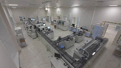 Timelapse of automated production line assembling at plant