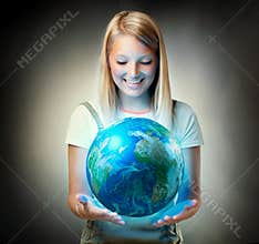 Girl holding the Planet Earth