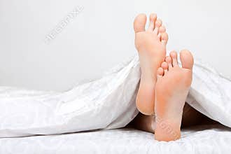Of two feet in a bed