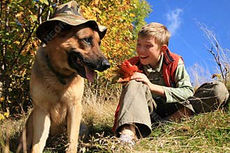 Boy and dog â€“ sunny fall